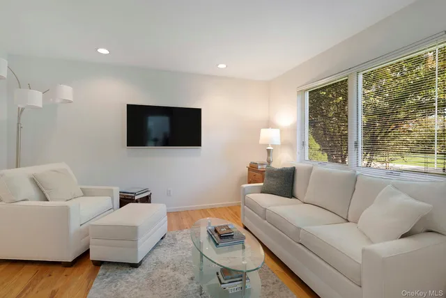 a bedroom with a large bed and a view of bedroom
