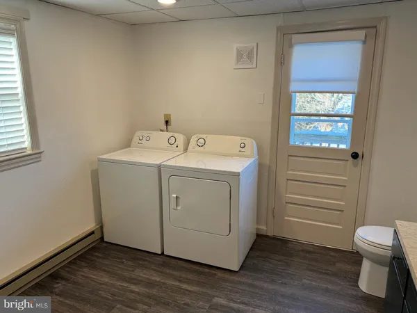 a utility room with dryer and washer