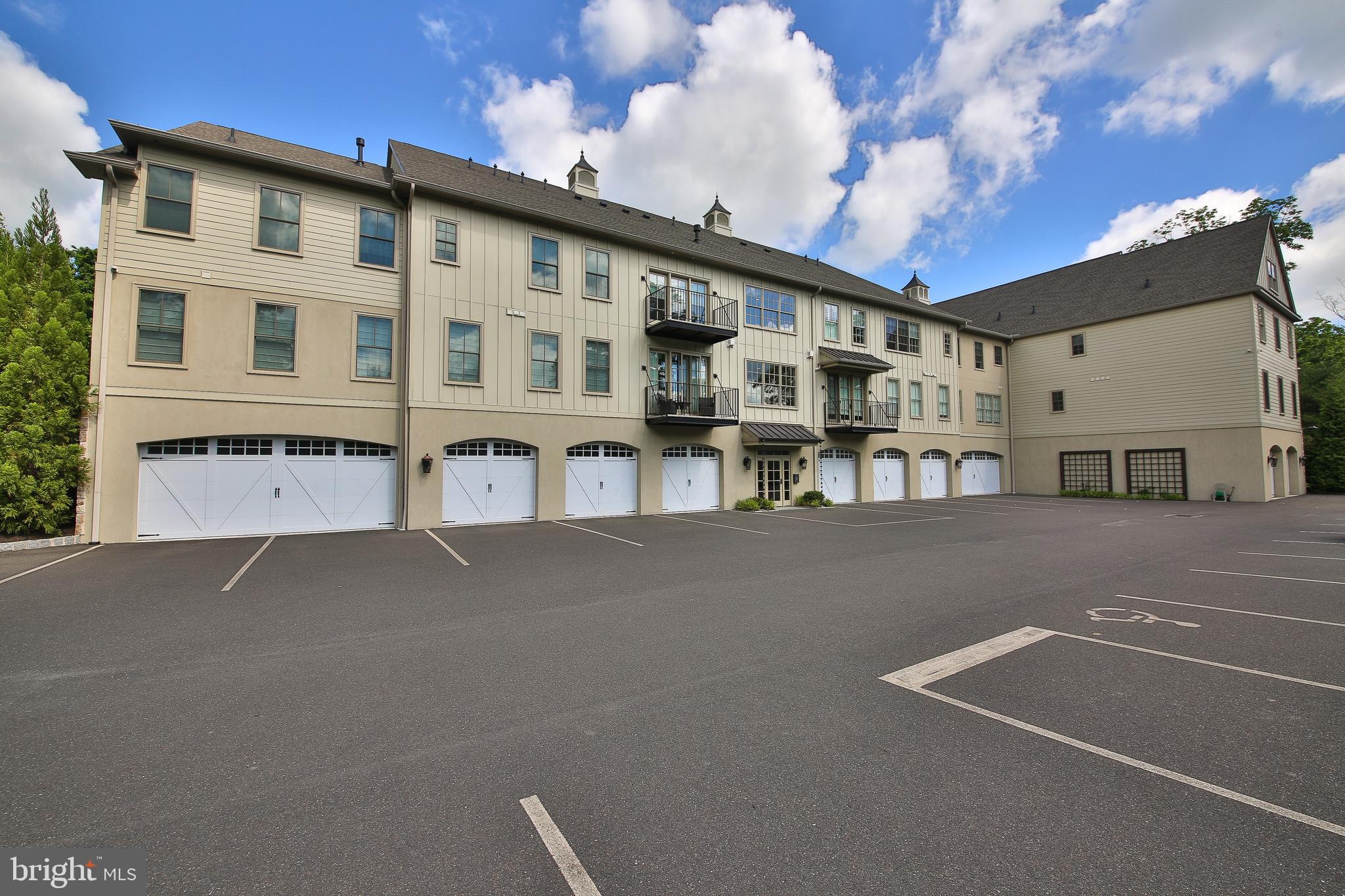 2401 Lower State Road, Unit 101 Doylestown, PA 18901 - Photo 41 of 41 Exterior View of Back Entrance and Garage Areas