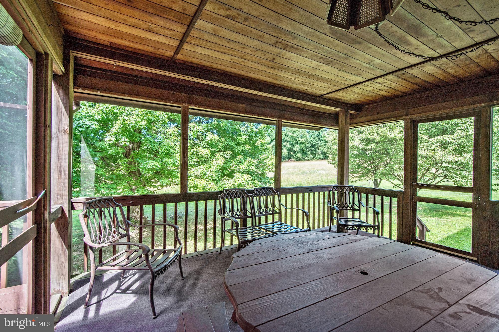 Porch with wood ceiling