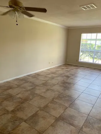 en empty room with windows