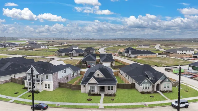 a bathroom with a sink a tub and a mirror