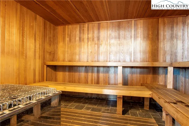 a bathroom with a bathtub and window