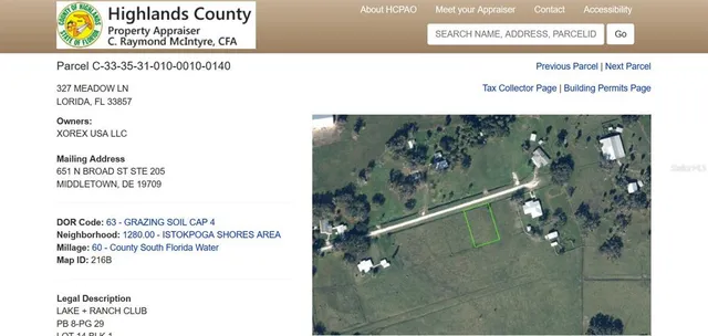 a view of a park with large trees