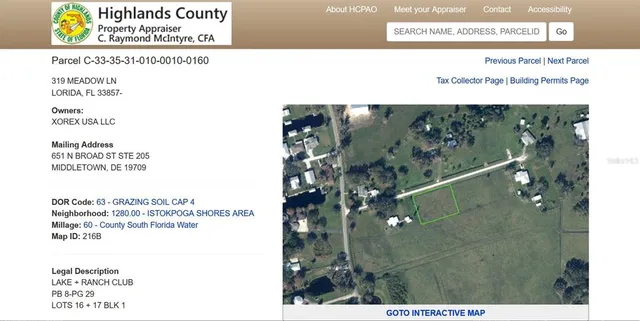 a view of a park with large trees