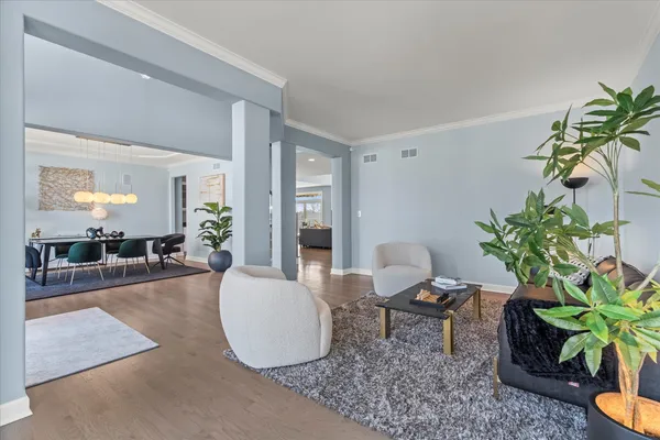 a view of entryway with wooden floor