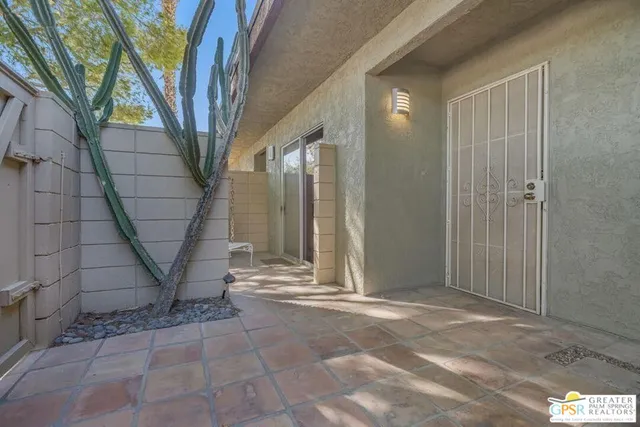 a view of a room with large tree