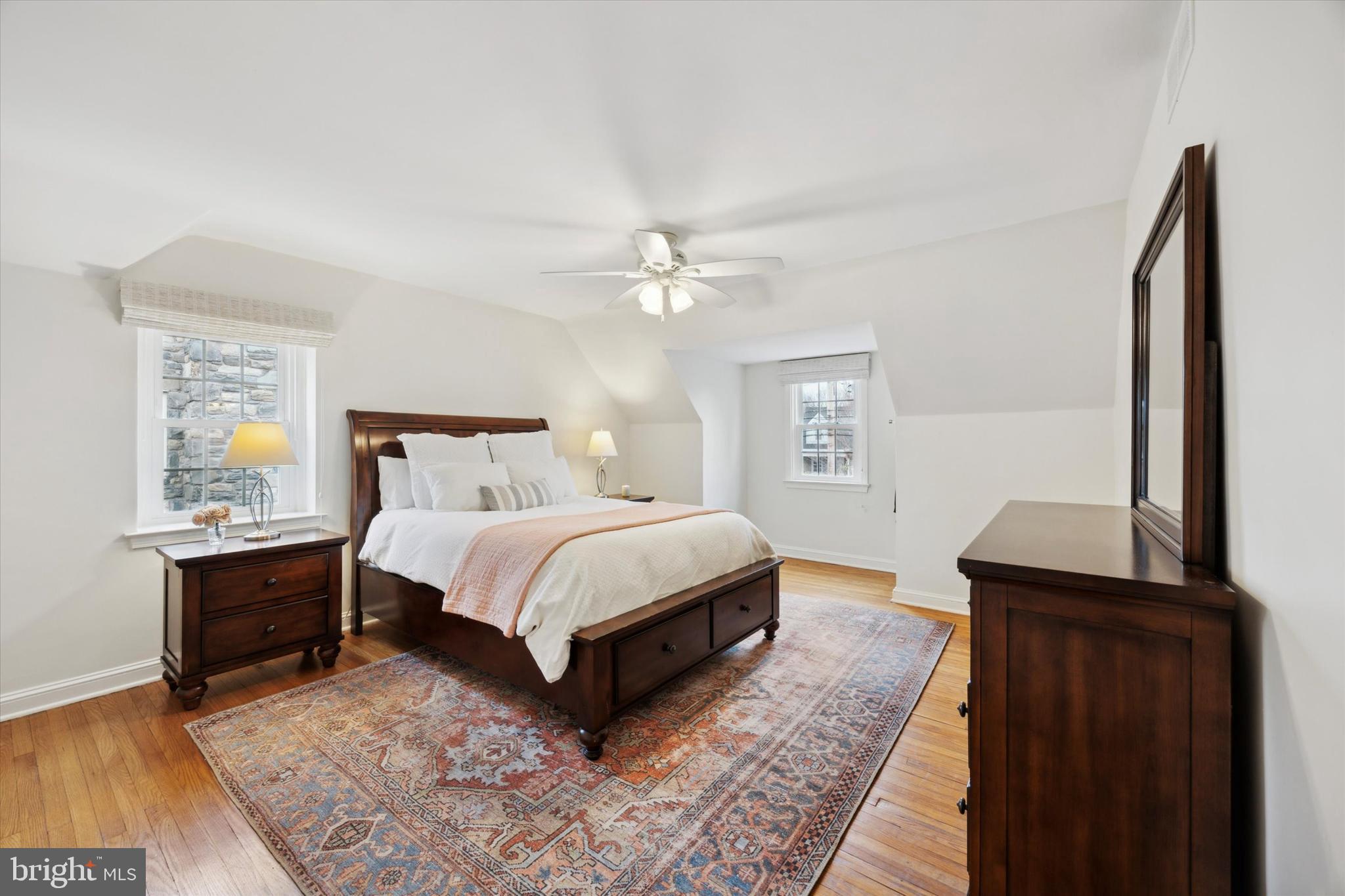 40 Providence Road Morton, PA 19070 - Photo 22 of 34 a bedroom with a bed and a night stand