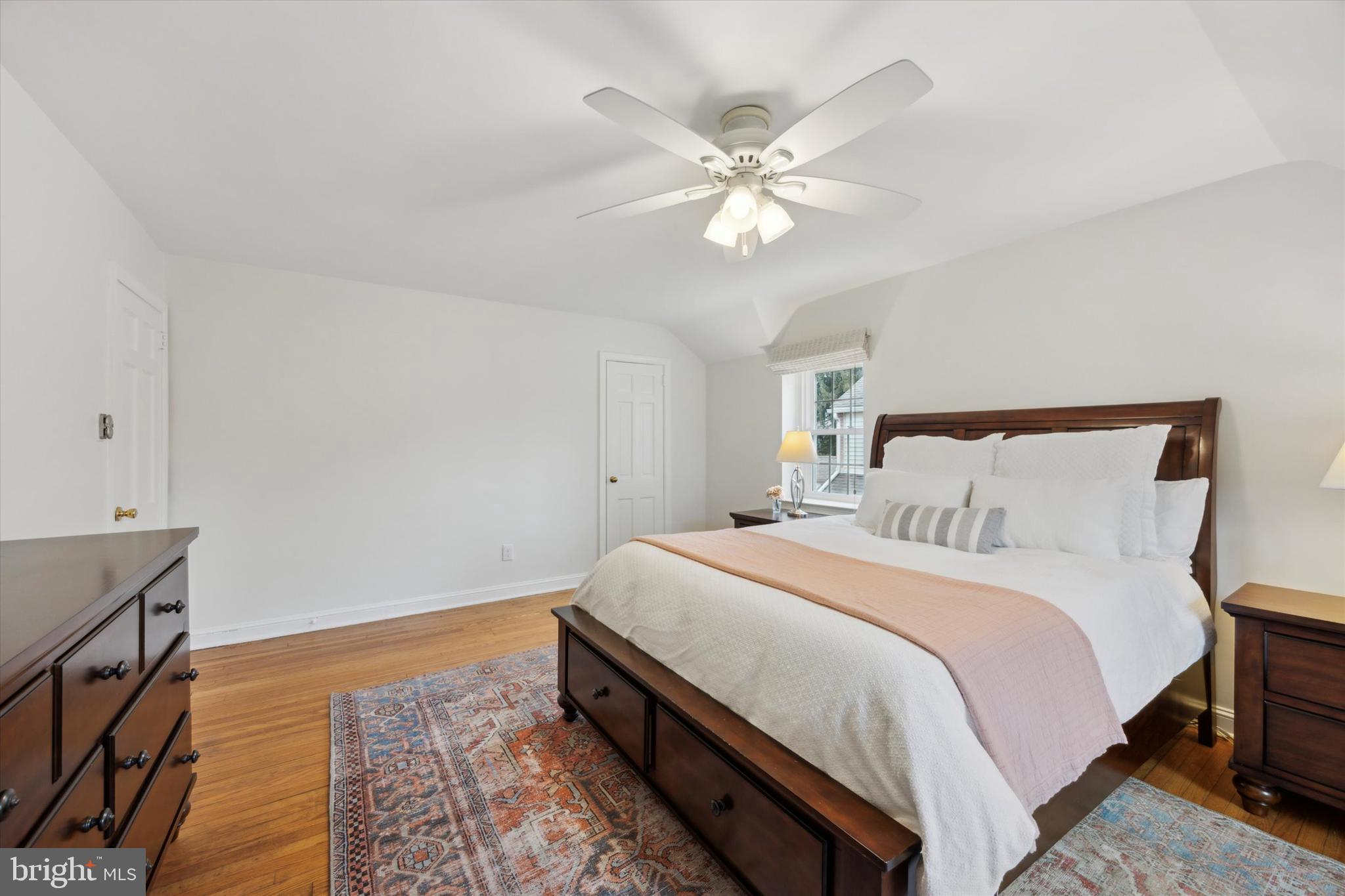 40 Providence Road Morton, PA 19070 - Photo 24 of 34 a bedroom with a bed and a chandelier