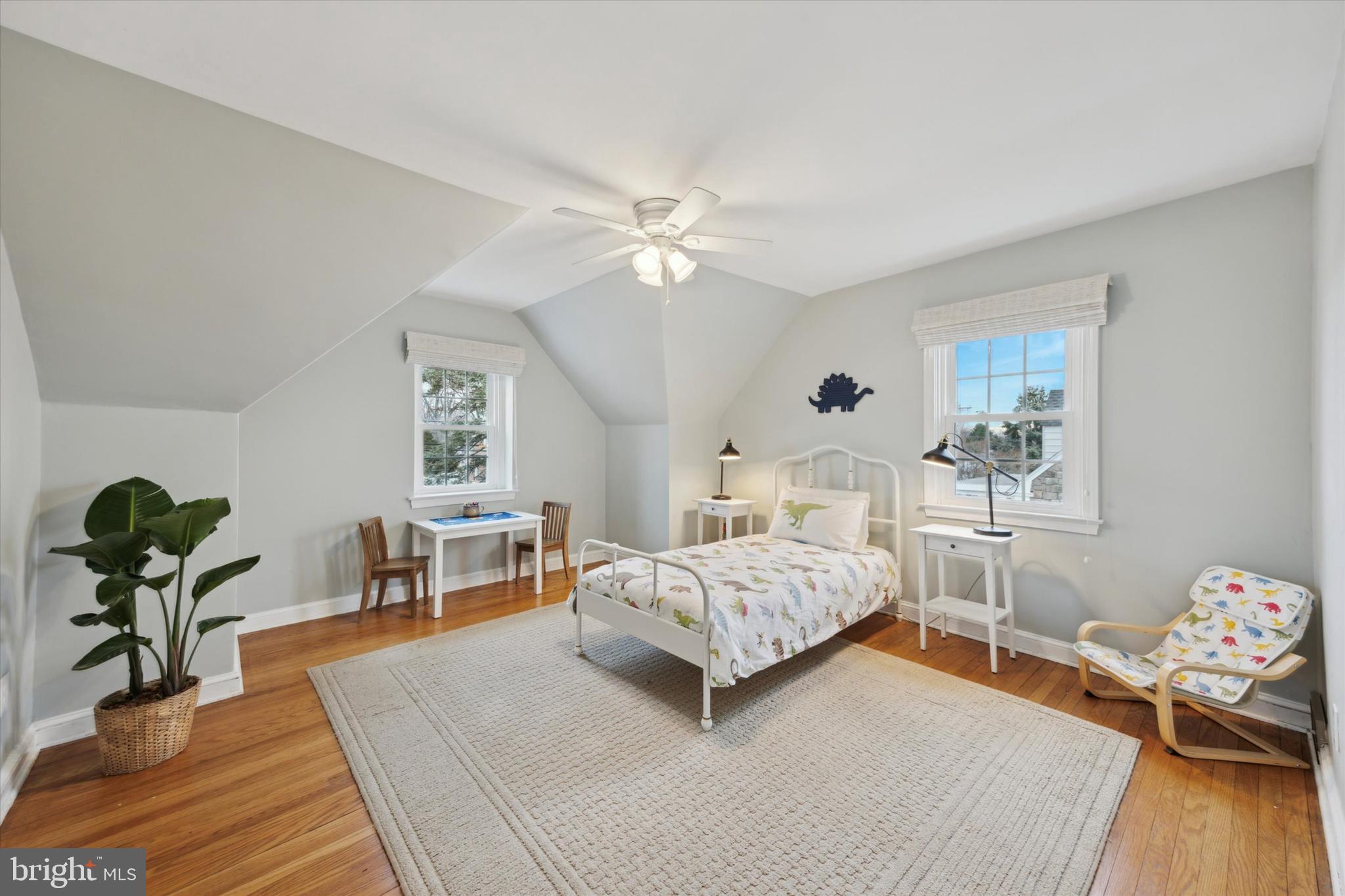 40 Providence Road Morton, PA 19070 - Photo 25 of 34 a bedroom with a bed and potted plant