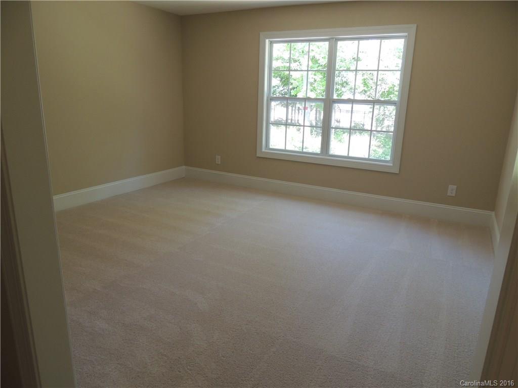 905 Ospre Lane, Unit 142 Fort Mill, SC 29708 - Photo 20 of 24 an empty room with a window