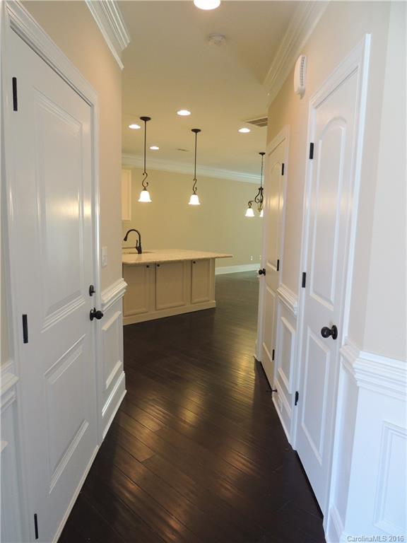 905 Ospre Lane, Unit 142 Fort Mill, SC 29708 - Photo 3 of 24 a bathroom with a glass shower door