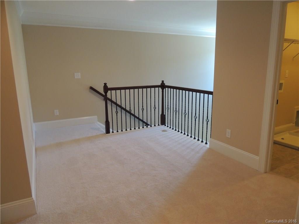 905 Ospre Lane, Unit 142 Fort Mill, SC 29708 - Photo 23 of 24 a view of a hallway
