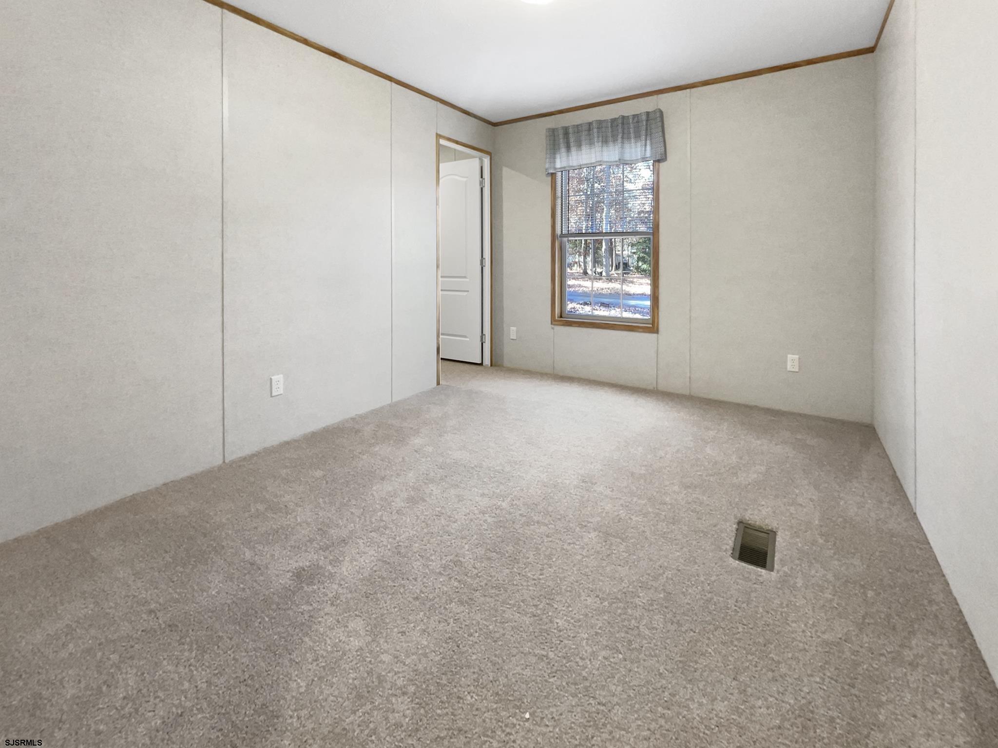 240 Mist Road Millville, NJ 08332 - Photo 19 of 48 an empty room with windows