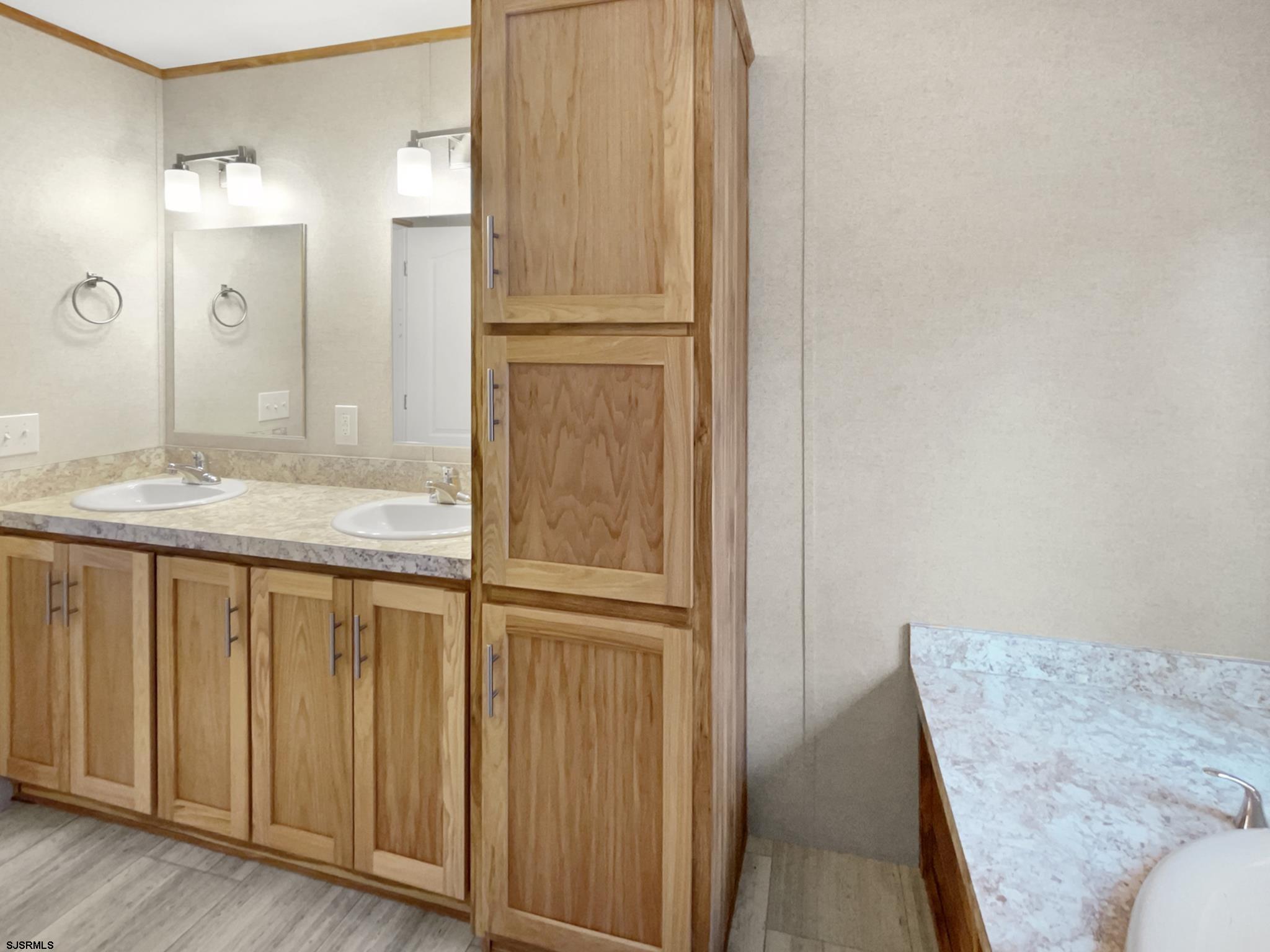 240 Mist Road Millville, NJ 08332 - Photo 27 of 48 a bathroom with a granite countertop sink and a mirror