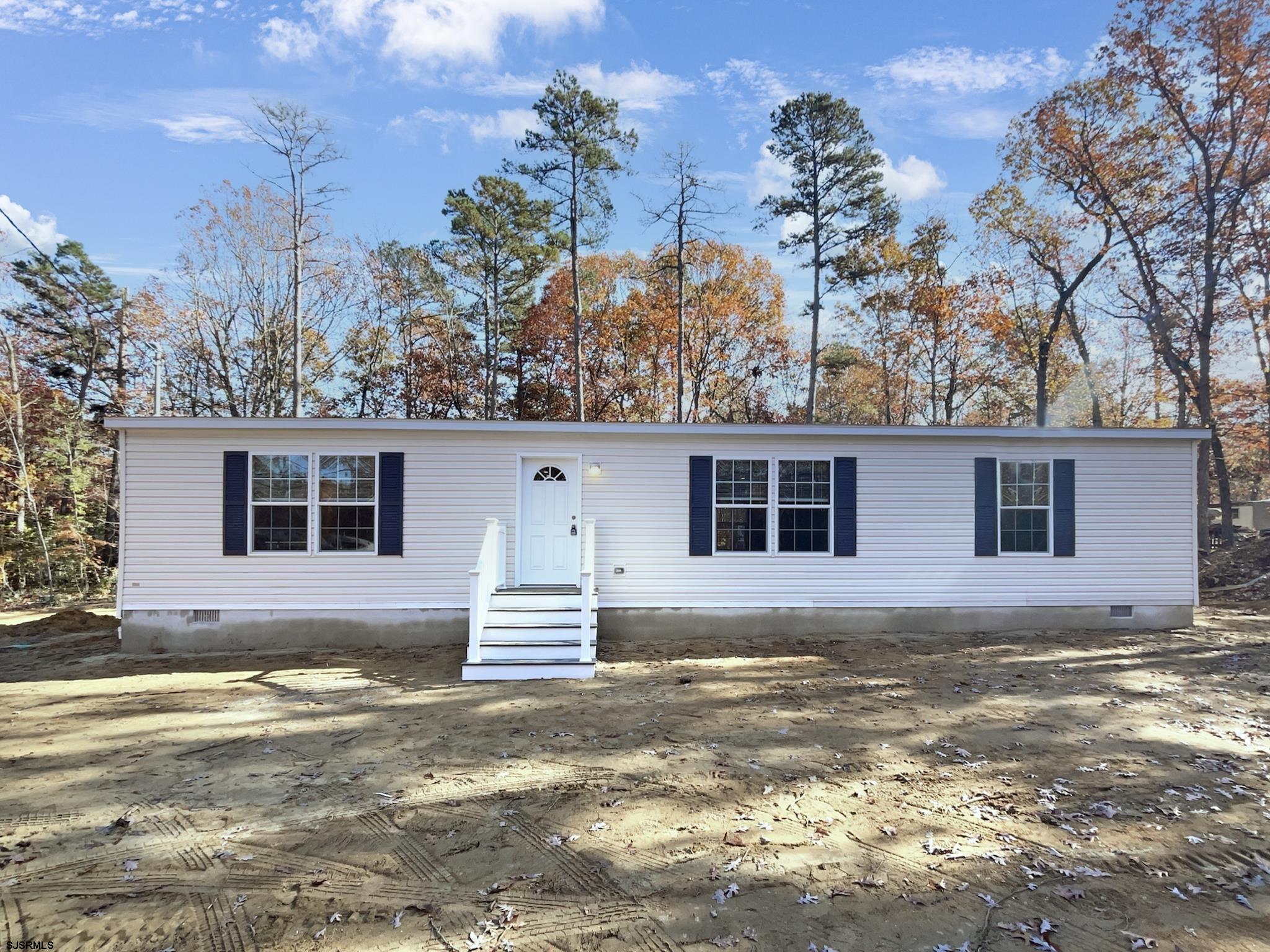 240 Mist Road Millville, NJ 08332 - Photo 3 of 48 a front view of a house with a yard