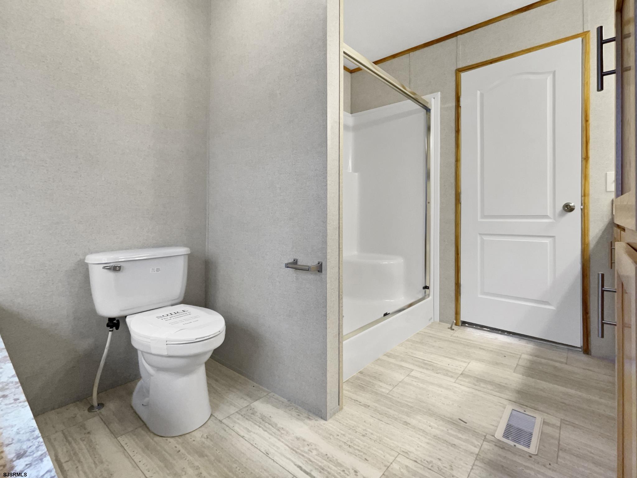 240 Mist Road Millville, NJ 08332 - Photo 32 of 48 a bathroom with a toilet and a shower