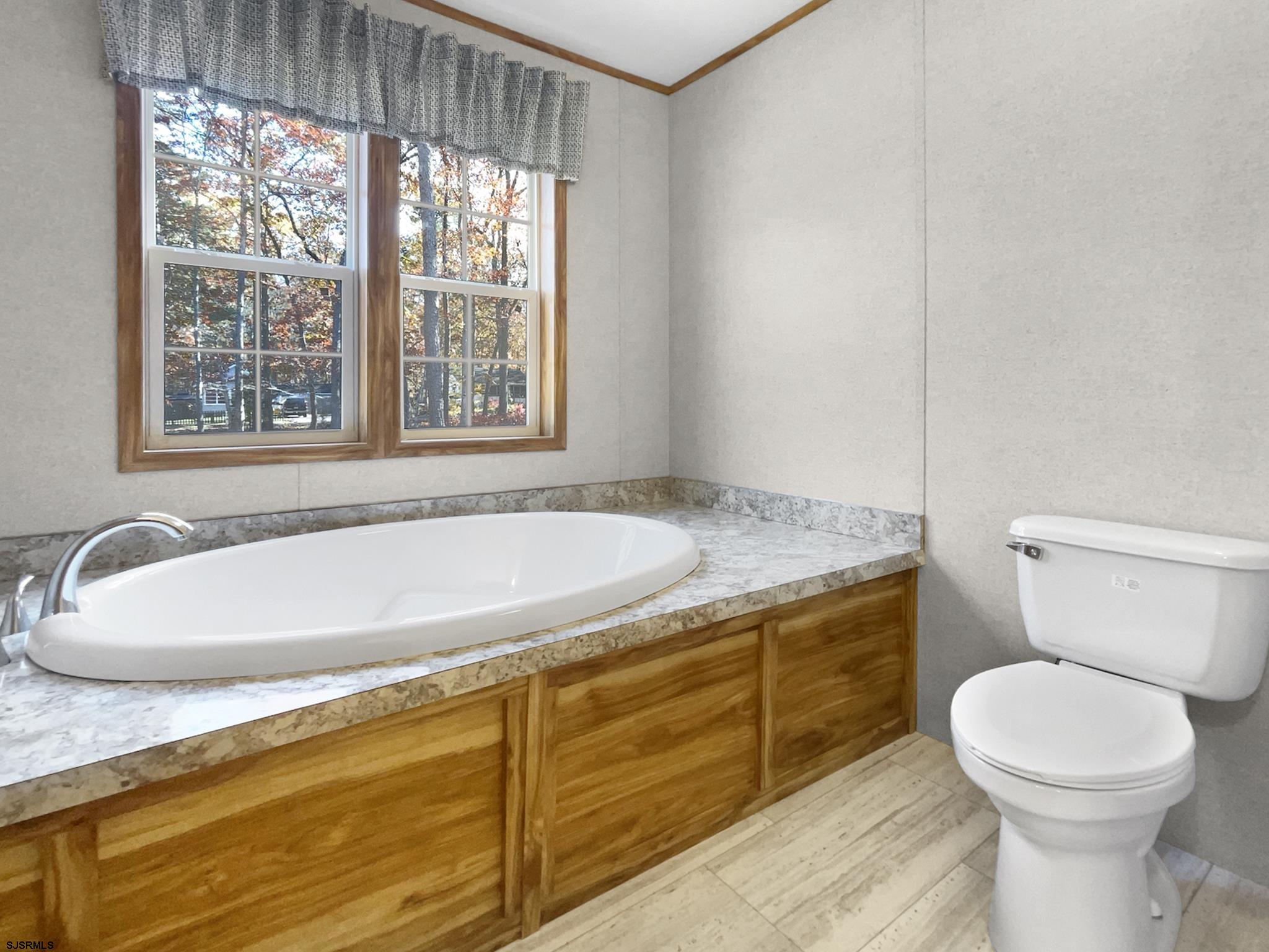240 Mist Road Millville, NJ 08332 - Photo 33 of 48 a bathroom with a sink and a toilet