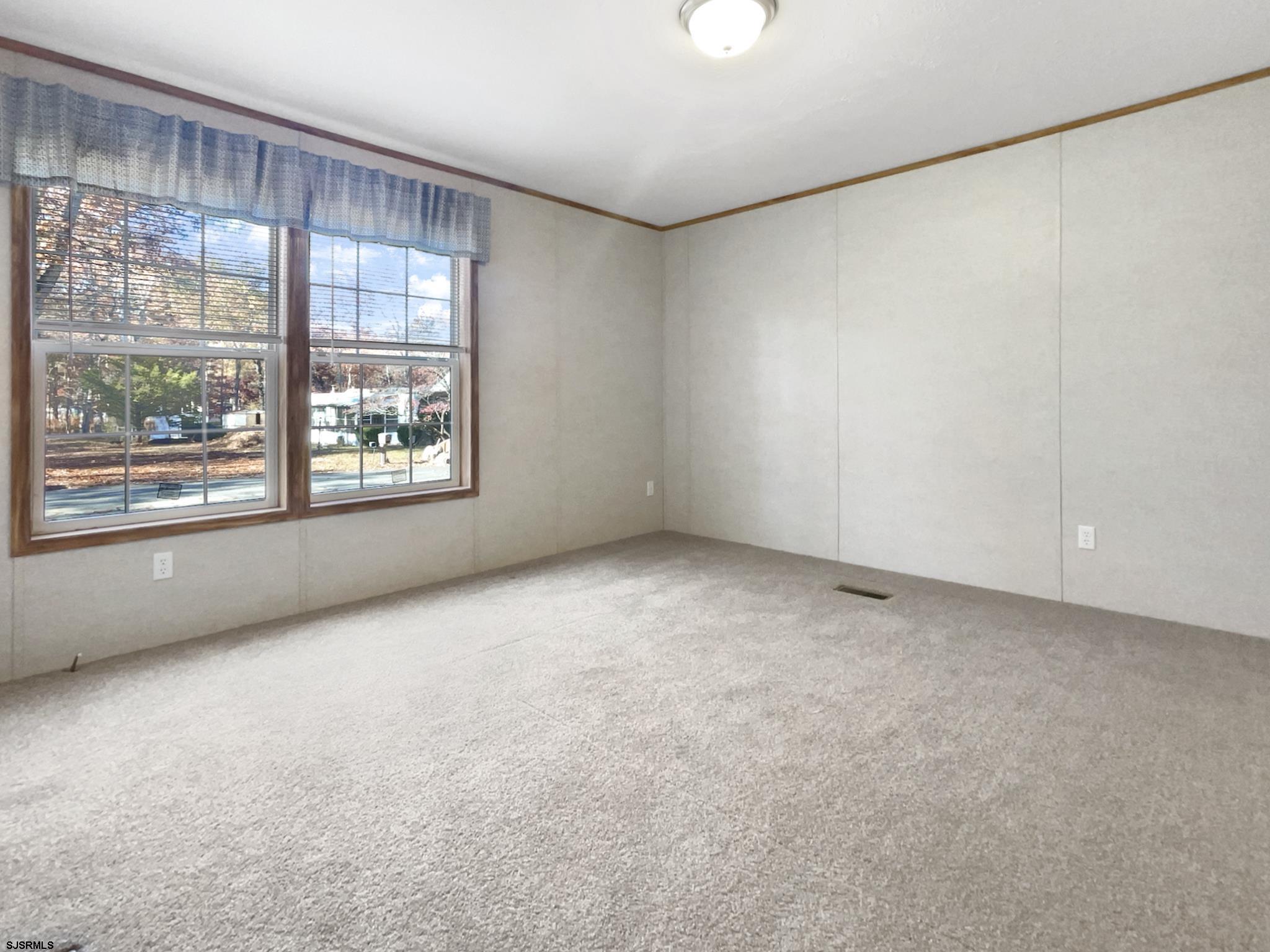 240 Mist Road Millville, NJ 08332 - Photo 38 of 48 an empty room with windows