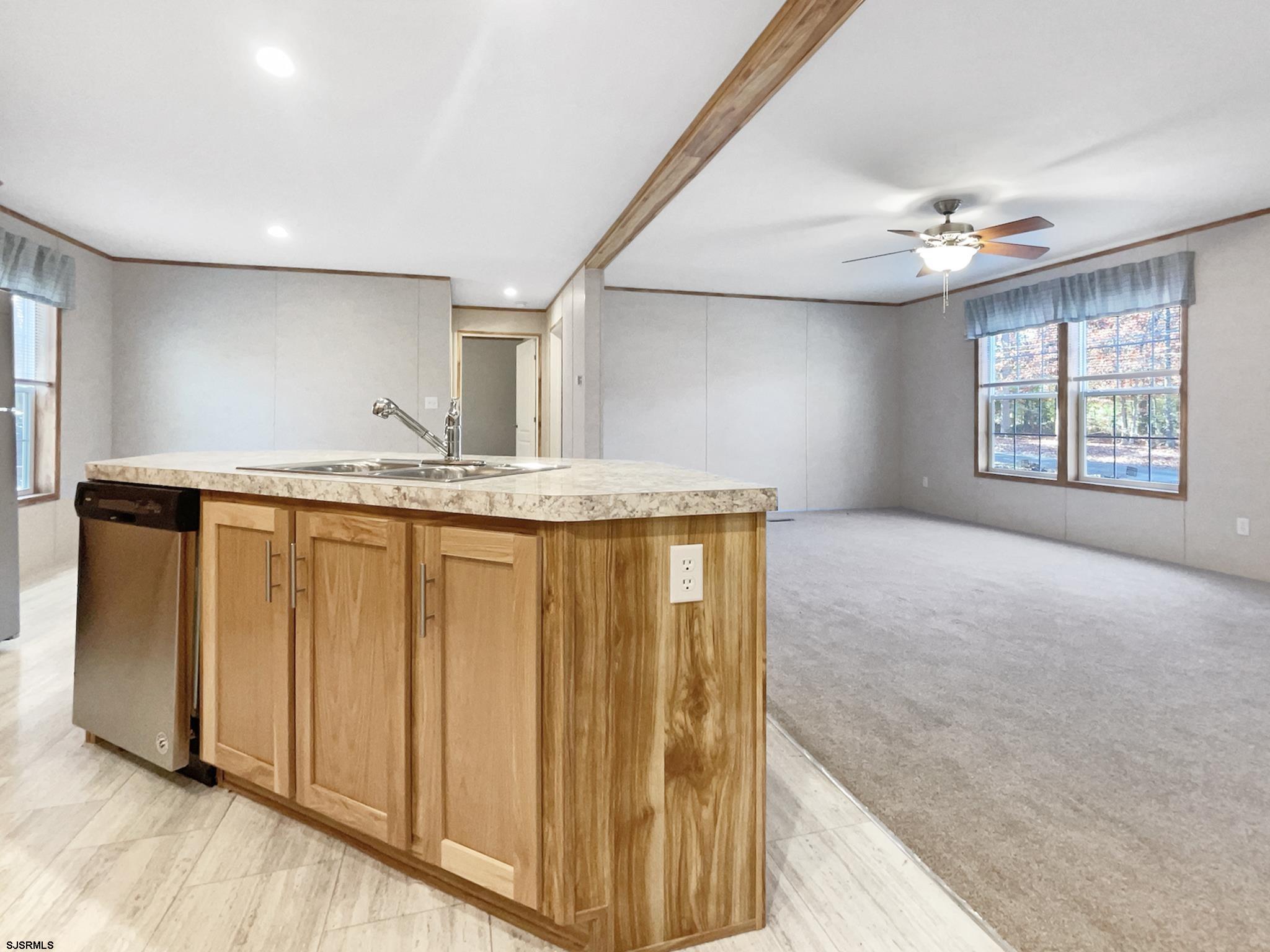 240 Mist Road Millville, NJ 08332 - Photo 4 of 48 a view of a kitchen with a sink and dishwasher