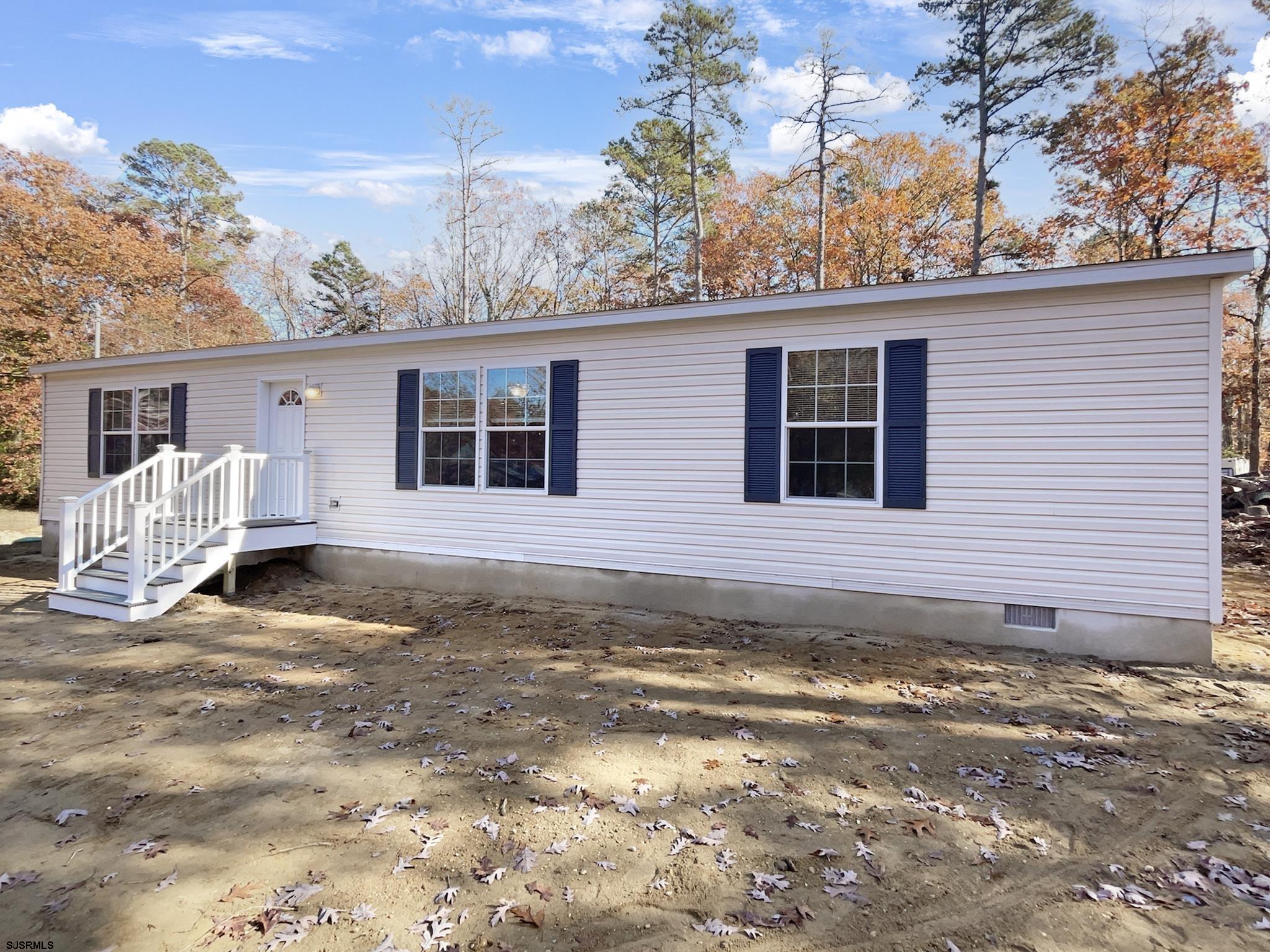 240 Mist Road Millville, NJ 08332 - Photo 43 of 48 a view of a house with a yard