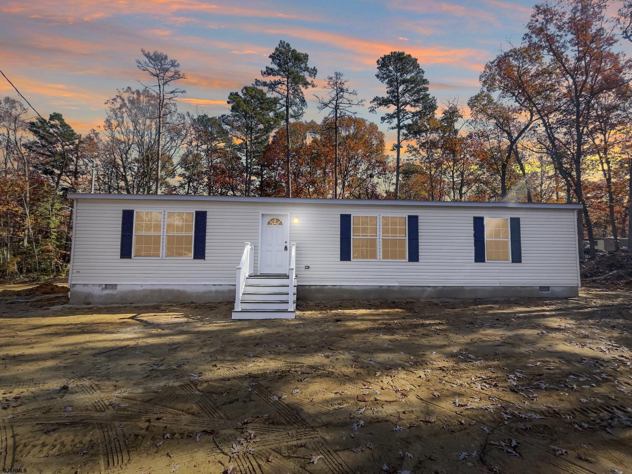 240 Mist Road Millville, NJ 08332 - Photo 44 of 48 a view of a house with a yard