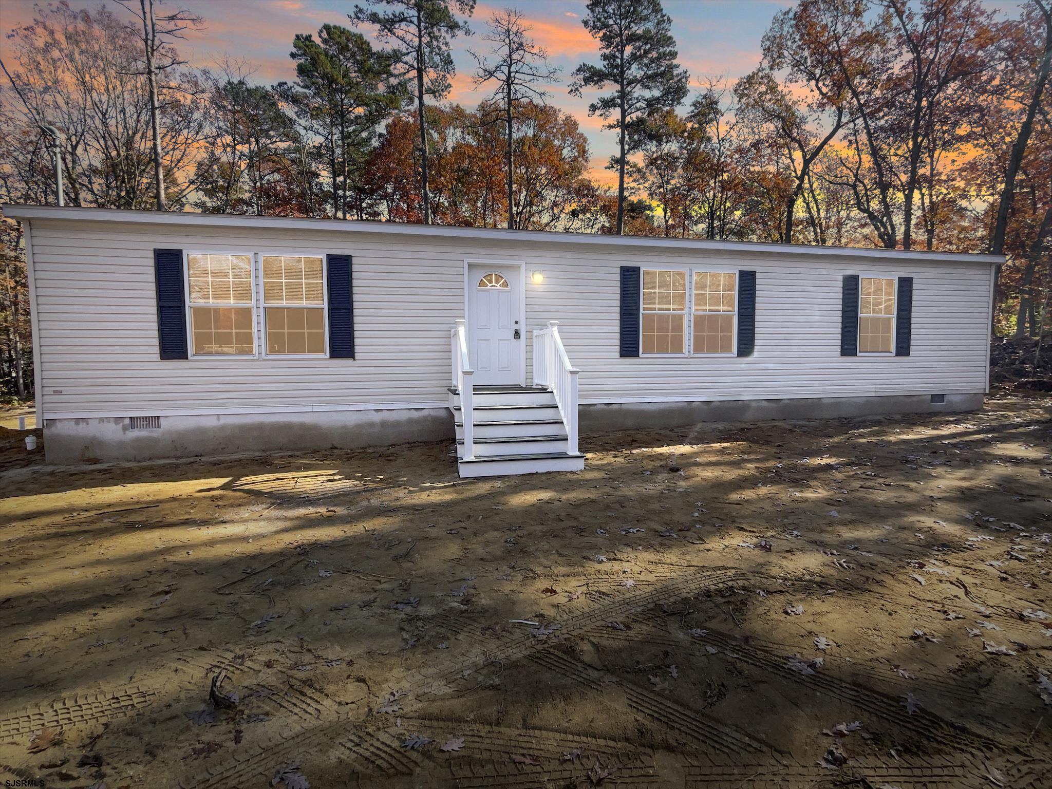 240 Mist Road Millville, NJ 08332 - Photo 45 of 48 a view of a house with a yard