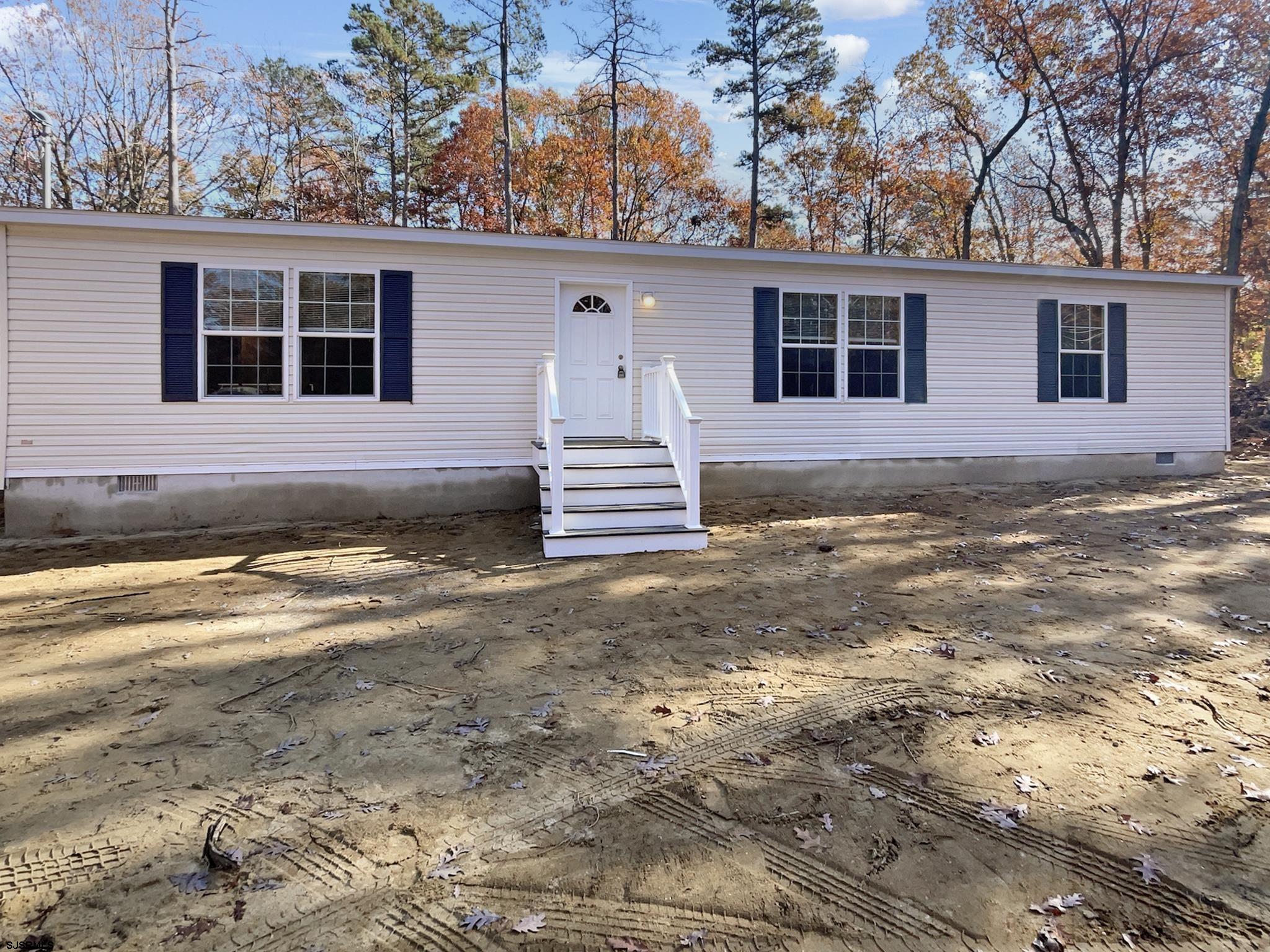 240 Mist Road Millville, NJ 08332 - Photo 46 of 48 a view of a house with a yard