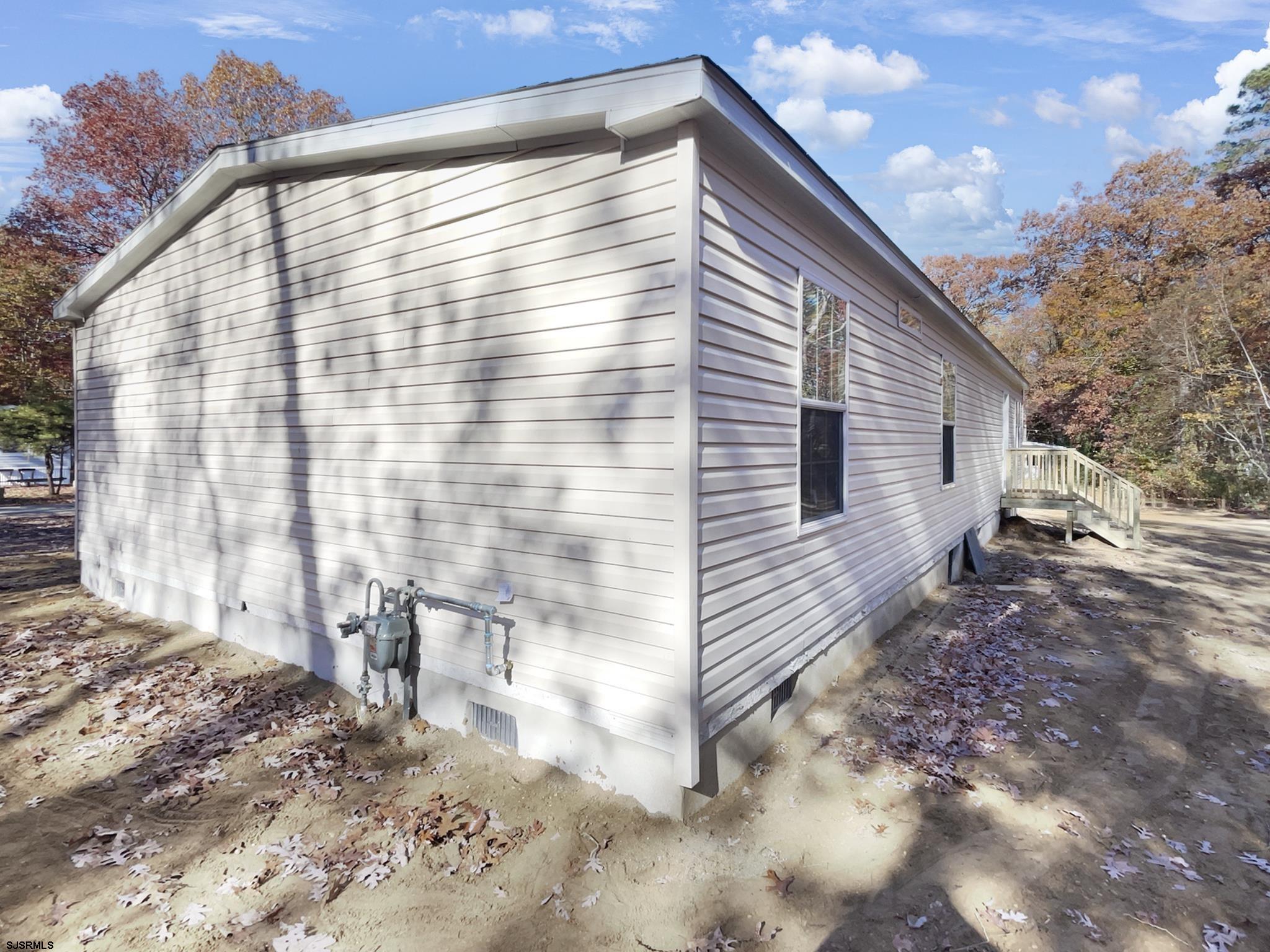 240 Mist Road Millville, NJ 08332 - Photo 48 of 48 a view of a house with a yard