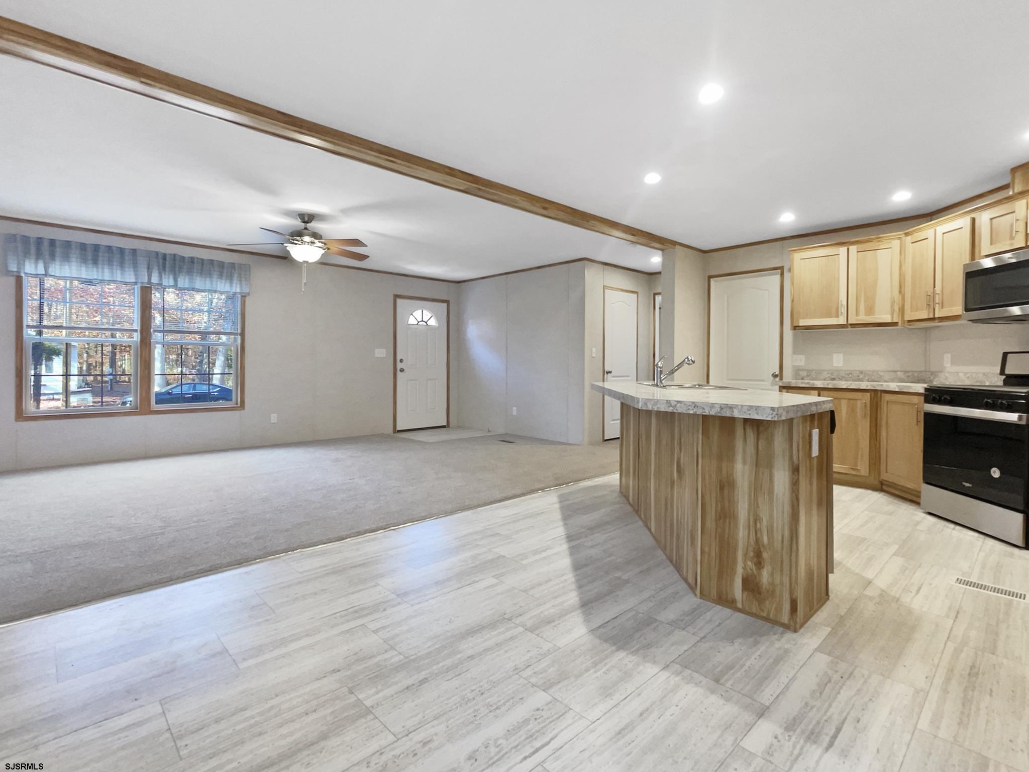 240 Mist Road Millville, NJ 08332 - Photo 10 of 48 a view of kitchen with kitchen island and stainless steel appliances