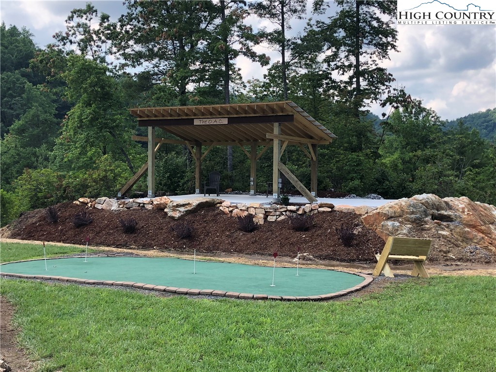 Lot 85 Woodpecker Road Purlear, NC 28665 - Photo 20 of 26 a view of a house with backyard