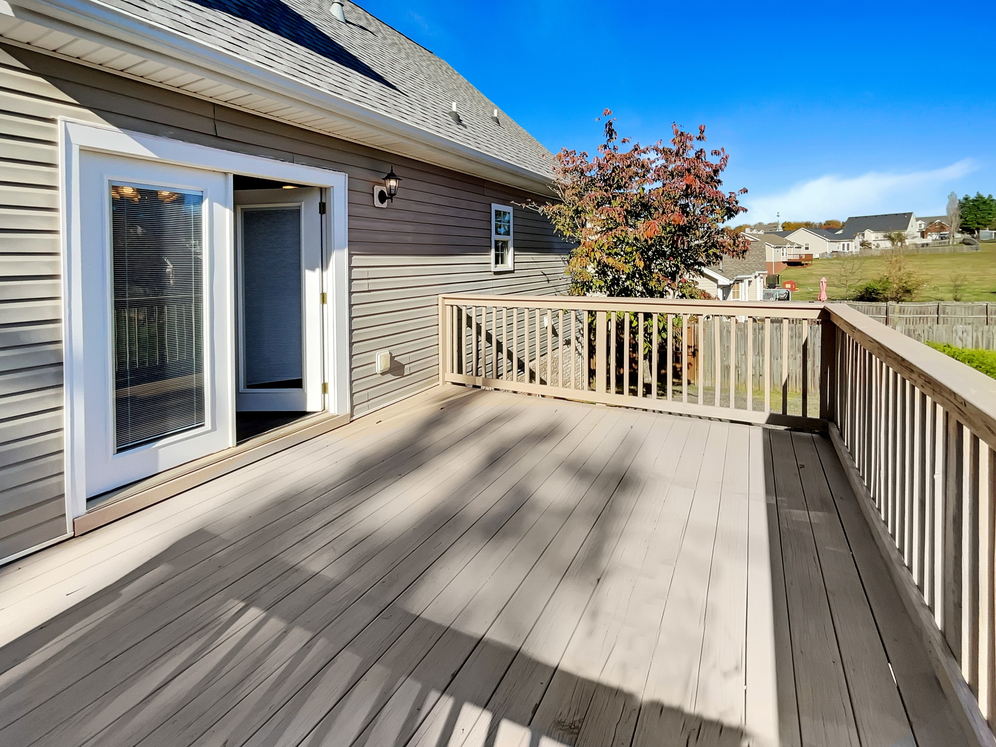 1837 Twin Rivers Road Clarksville, TN 37040 - Photo 17 of 19 a view of backyard with a deck and wooden floor