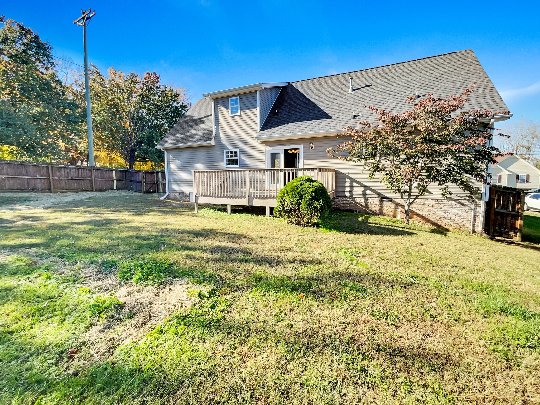 1837 Twin Rivers Road Clarksville, TN 37040 - Photo 19 of 19 a view of a house with a yard