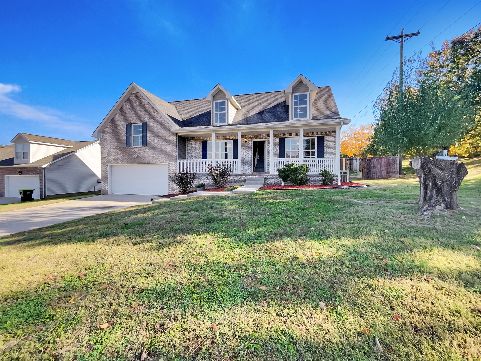 1837 Twin Rivers Road Clarksville, TN 37040 - Photo 2 of 19 a front view of a house with a yard
