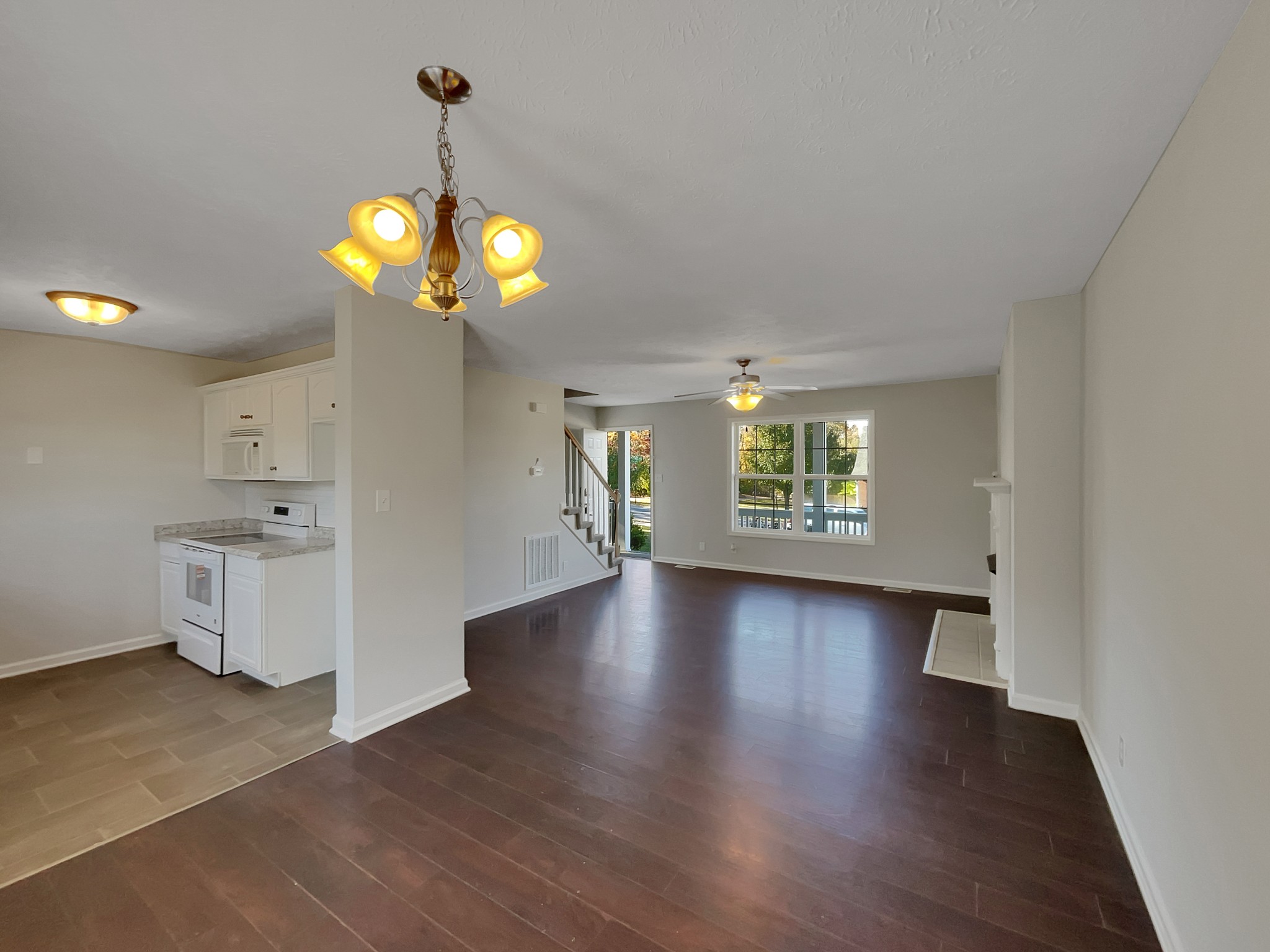 1837 Twin Rivers Road Clarksville, TN 37040 - Photo 5 of 19 a view of a kitchen with wooden floor and a window