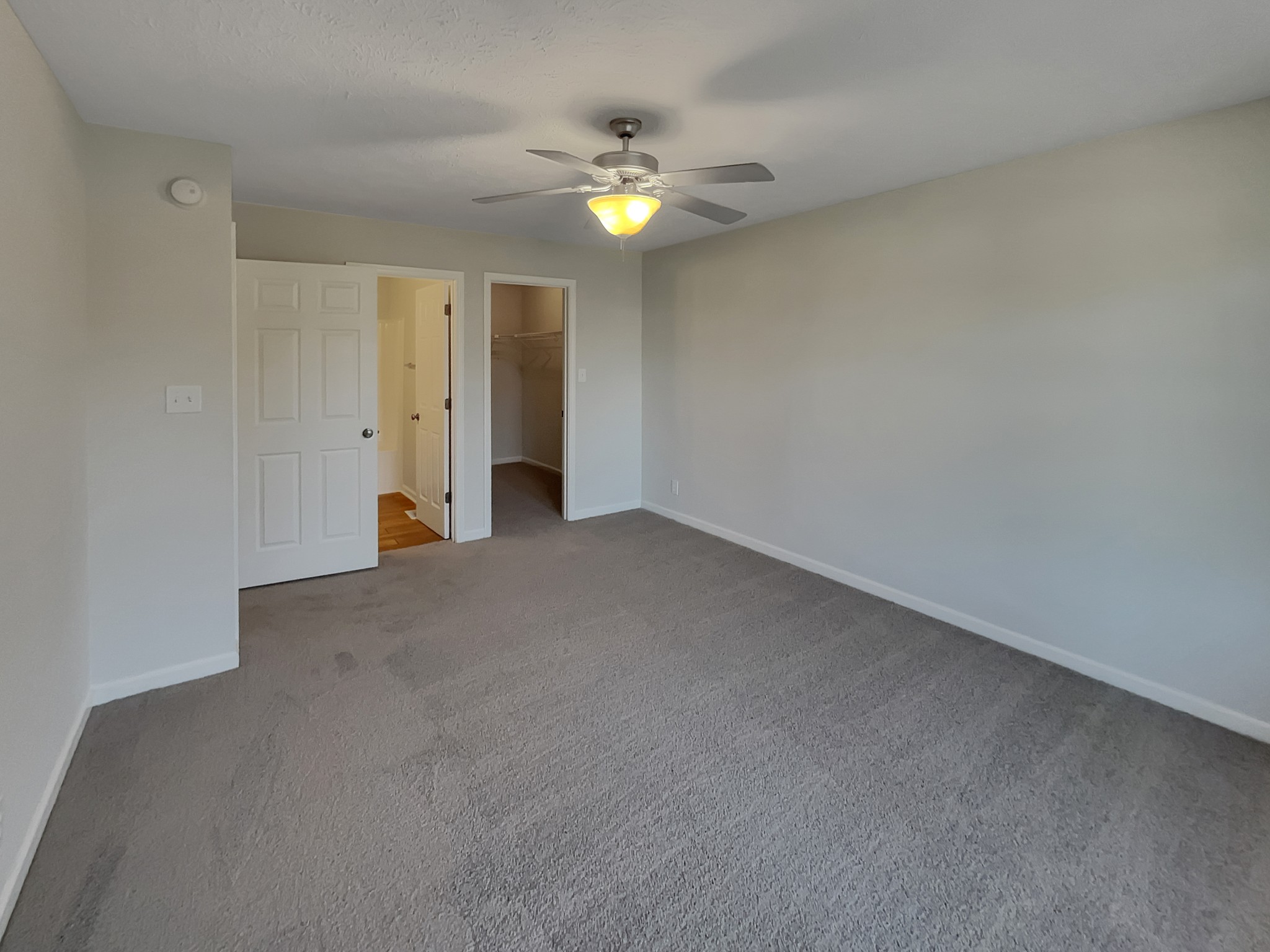 1837 Twin Rivers Road Clarksville, TN 37040 - Photo 8 of 19 a view of an empty room with a ceiling fan and window