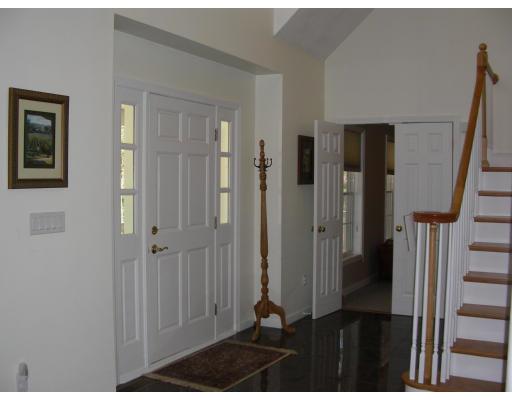 64 Sugar Road Bolton, MA 01740 - Photo 17 of 30 a view of a hallway with a elevator