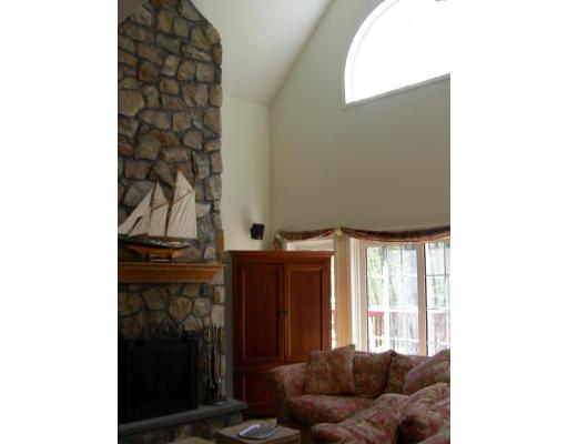 64 Sugar Road Bolton, MA 01740 - Photo 23 of 30 a living room with furniture and a window