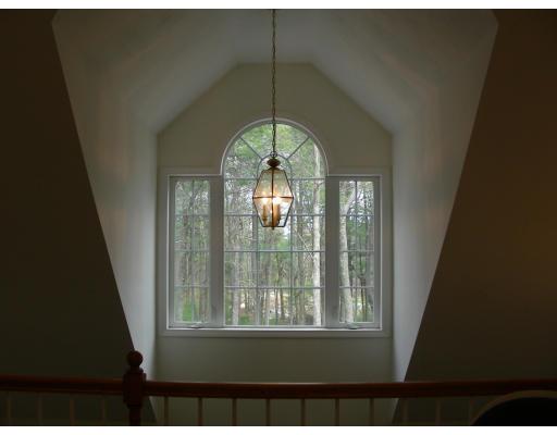 64 Sugar Road Bolton, MA 01740 - Photo 9 of 30 a view of a hallway in a house