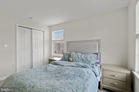a bathroom with a sink toilet vanity and shower
