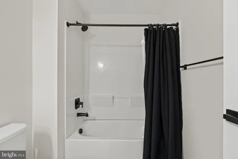 a view of a room with rack on the wall