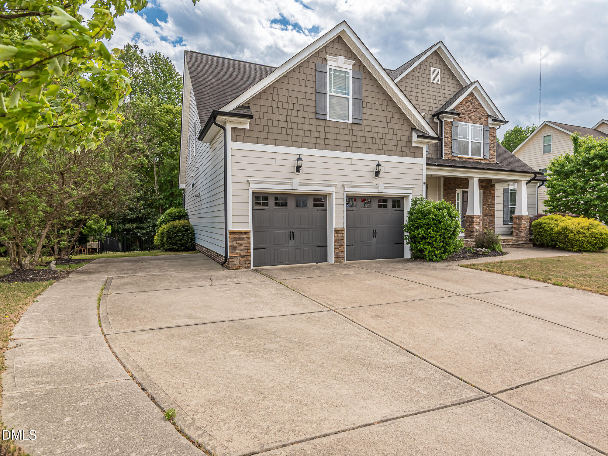 337 Shadowdale Lane Rolesville, NC 27571 - Photo 39 of 42 a view of a house with a yard and plants