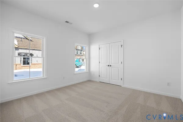 an empty room with windows