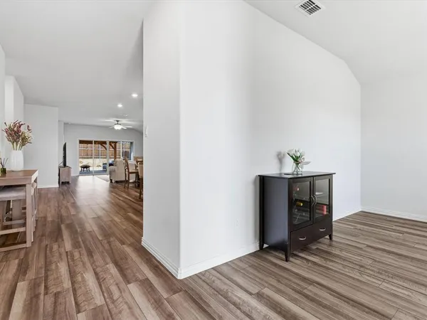 a view empty room with wooden floor and furniture