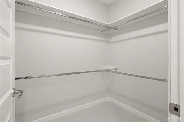 a bathroom with a shower and a shower