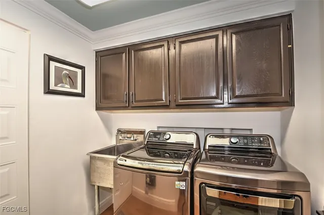 a kitchen with wooden cabinets and a stove top oven