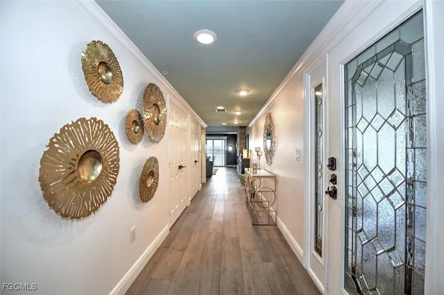 a view of entryway with wooden floor