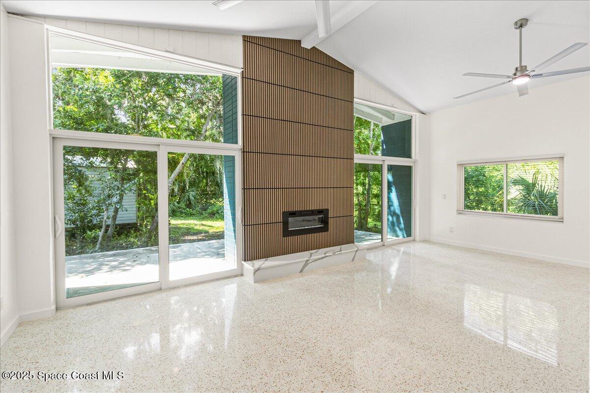 2302 Ruffner Road Melbourne, FL 32901 - Photo 22 of 80 a view of an empty room with a window