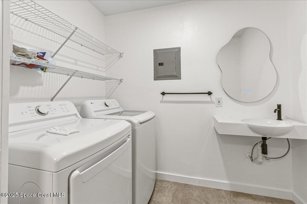 2302 Ruffner Road Melbourne, FL 32901 - Photo 41 of 80 a bathroom with a sink toilet and a mirror