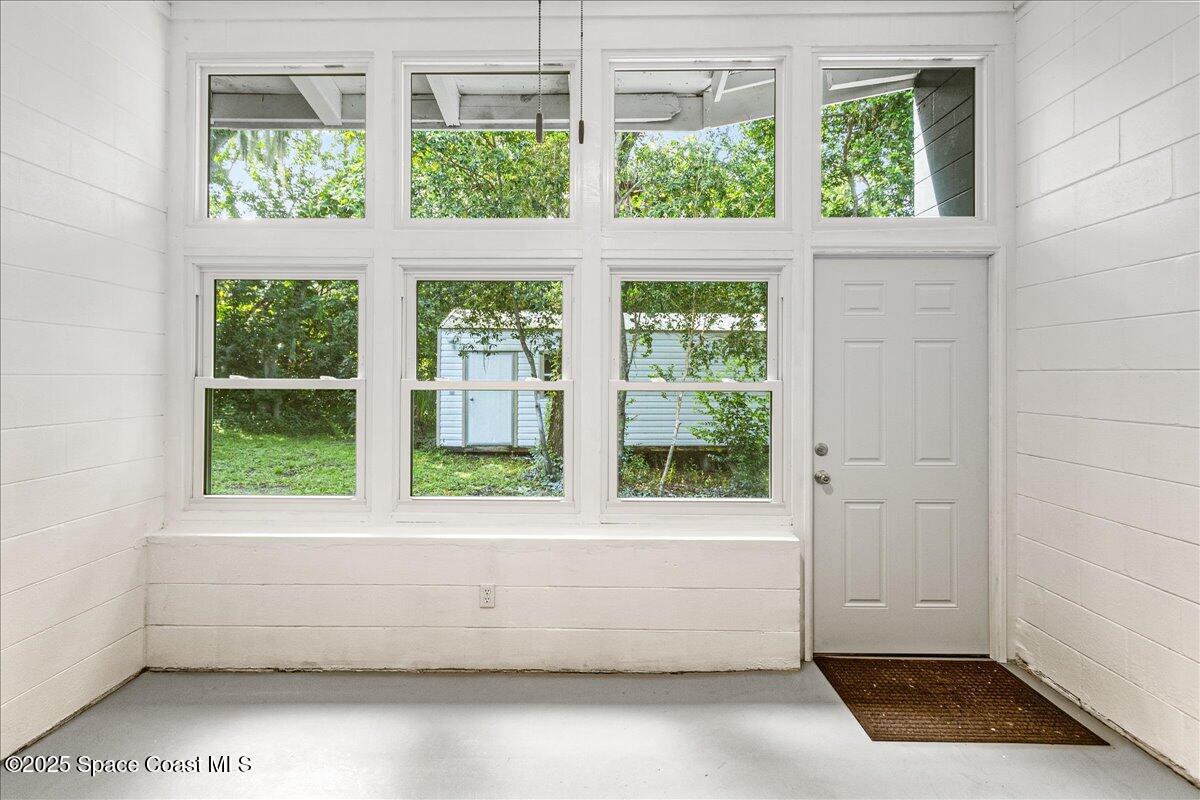 2302 Ruffner Road Melbourne, FL 32901 - Photo 43 of 80 an empty room with a window